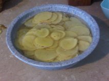 sliced potatoes in bowl
